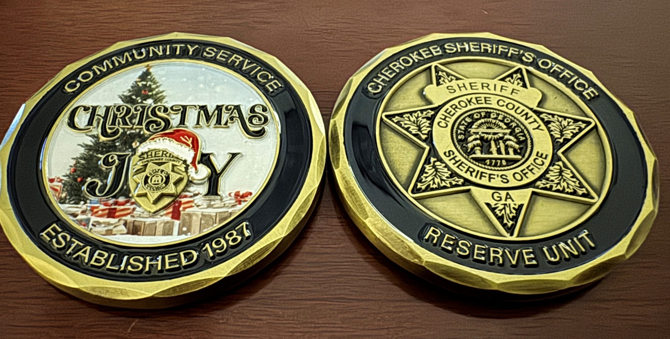 Cherokee Sheriff's Foundation challenge coin back with motto